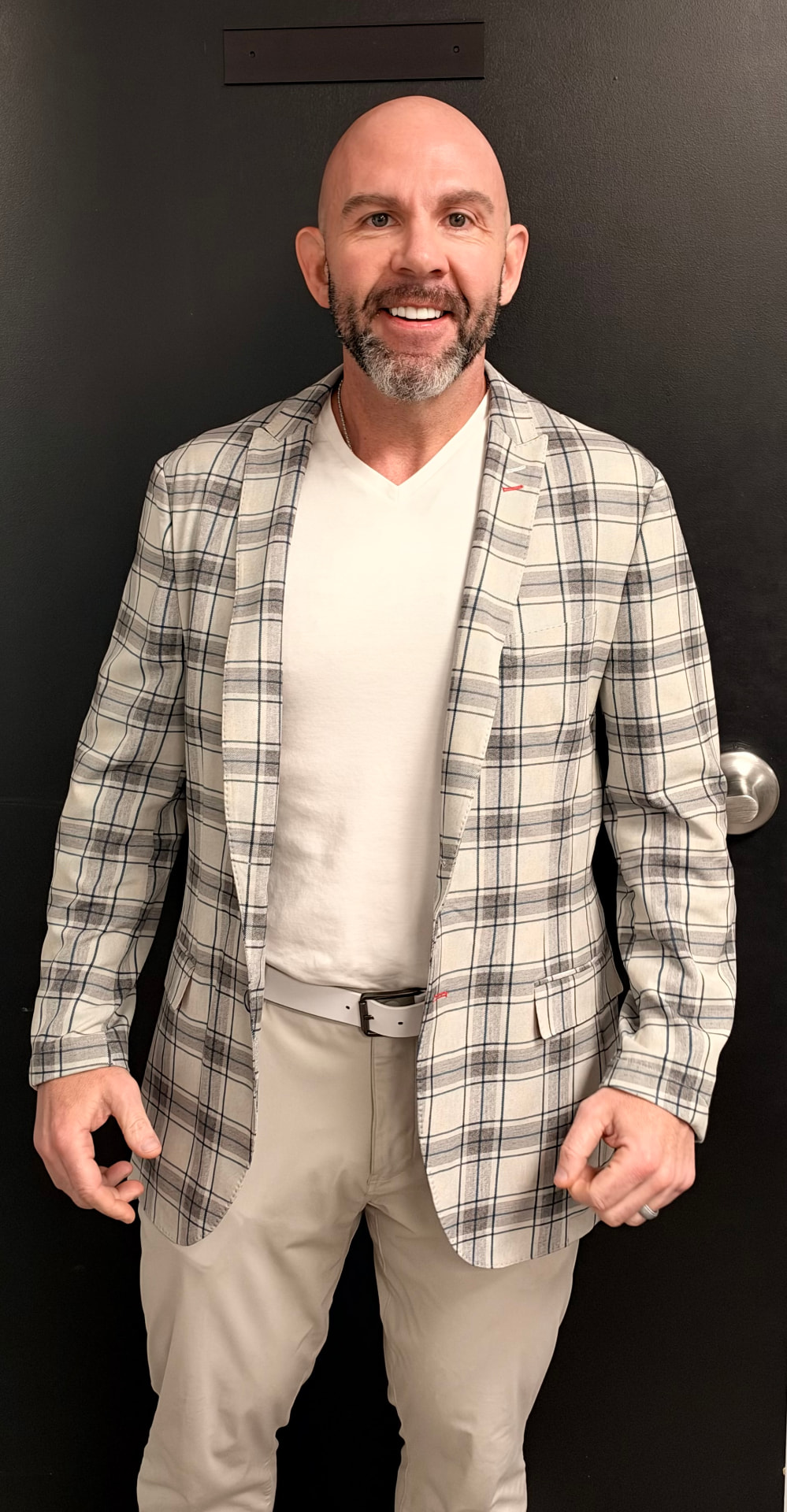 Jason Kindler in a plaid jacket